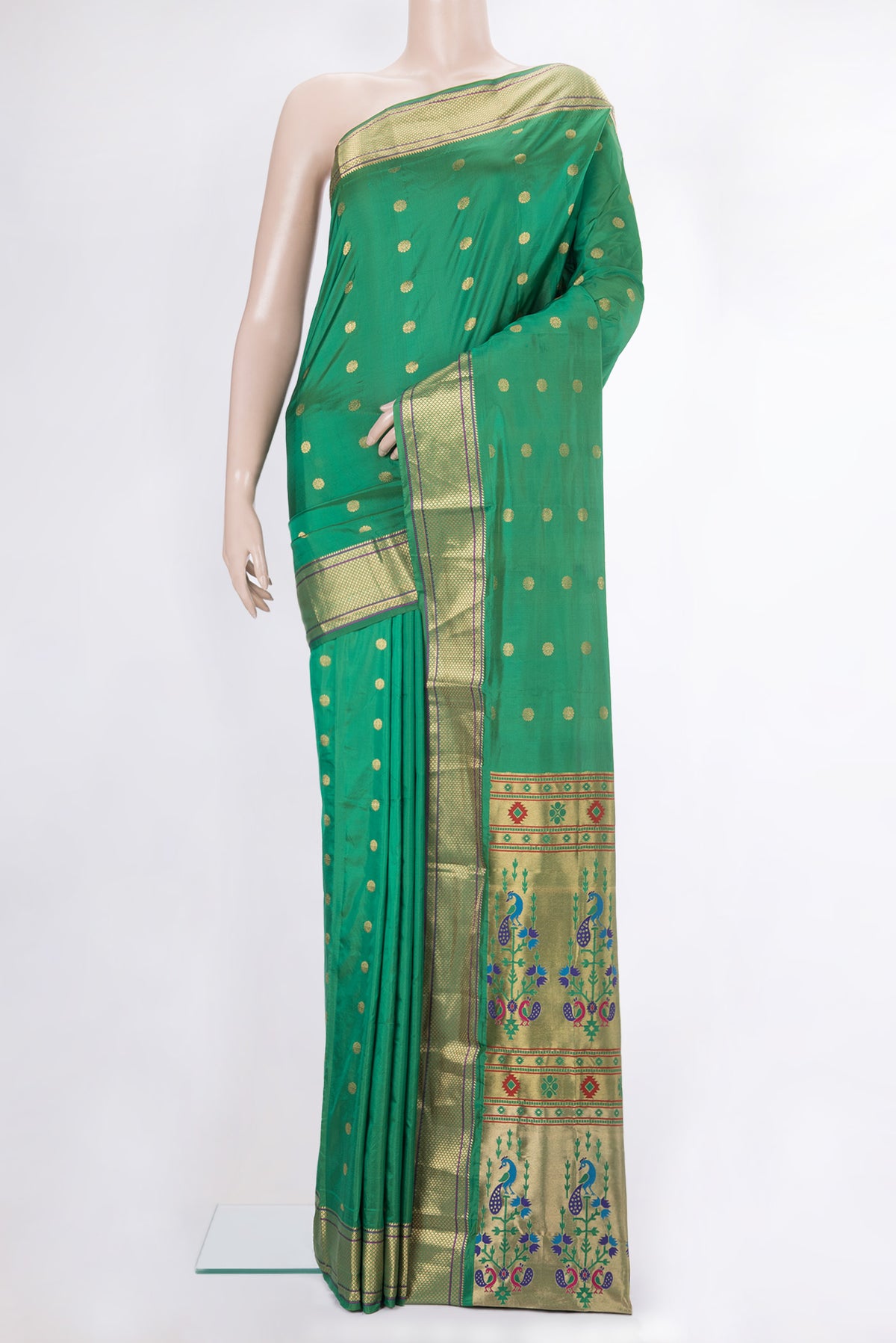Green Blended Paithani Silk Saree with Zari Butta on the body and Zari Border.  displayed on a mannequin