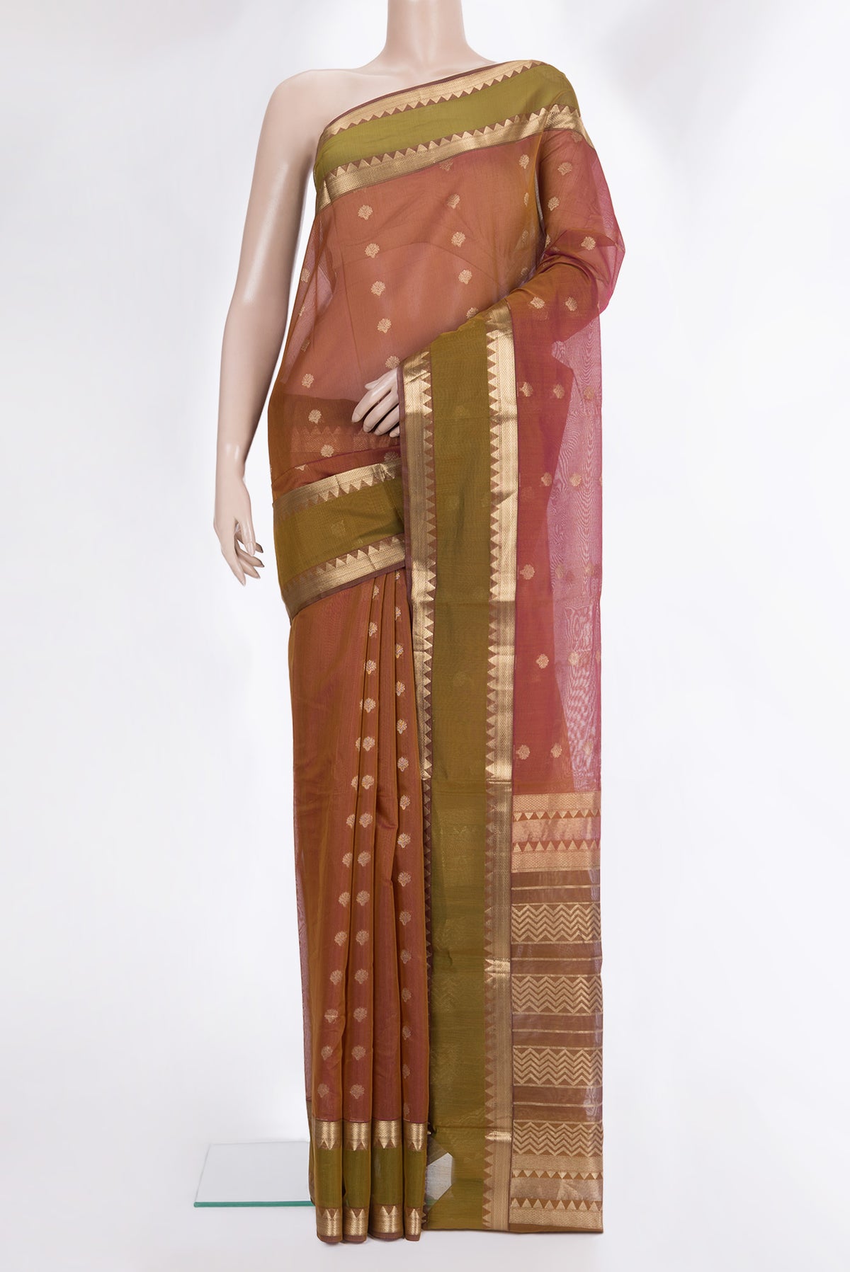 Mustard Dual Tone Silk Cotton Saree with Zari Butta on the body and Zari Border.  displayed on a mannequin