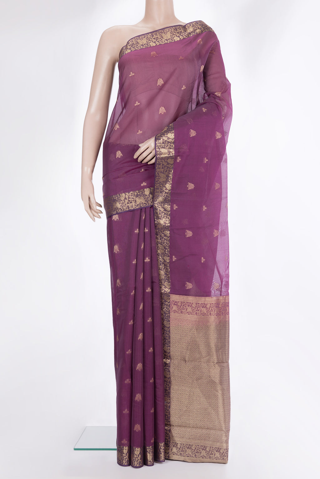 Magenta Silk Cotton Saree with Zari Butta on the body and Zari Border.  displayed on a mannequin