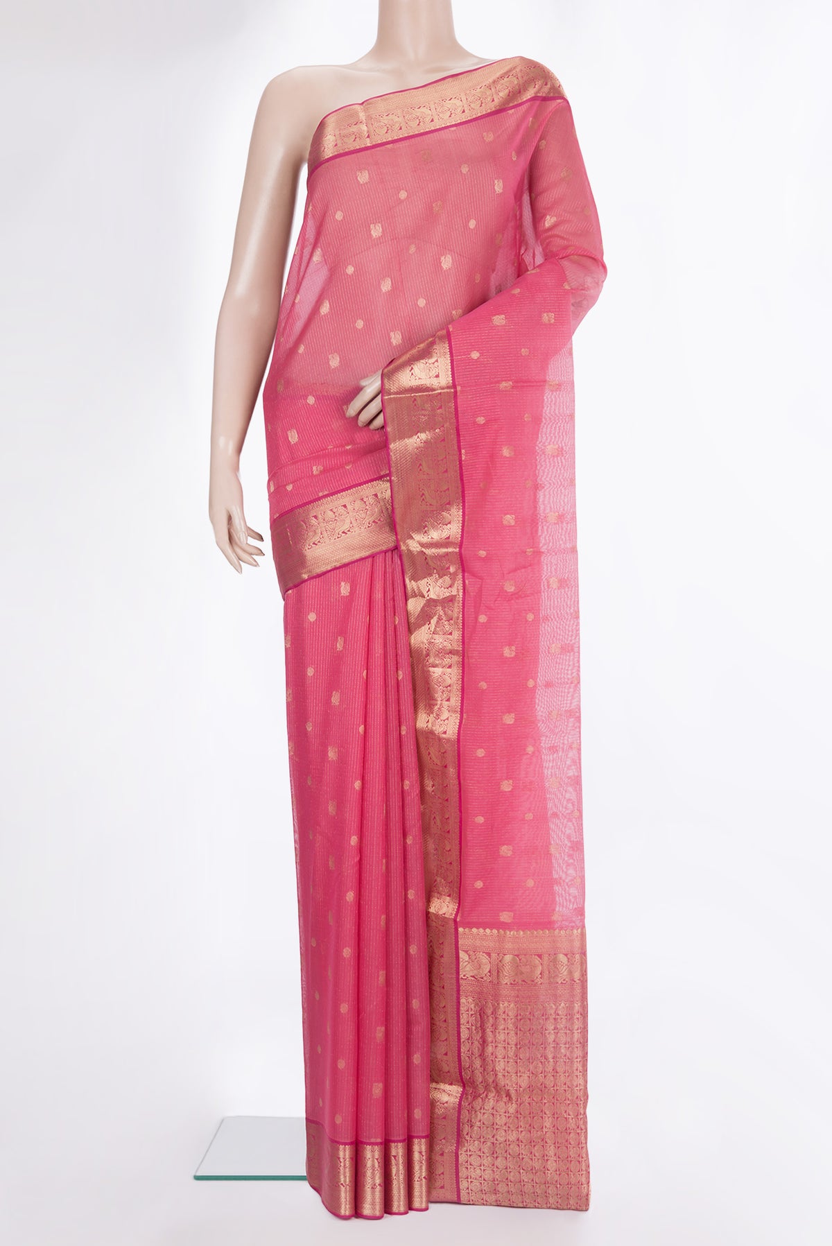 Coral Silk Cotton Saree with Zari Butta on the body and Zari Border.  displayed on a mannequin