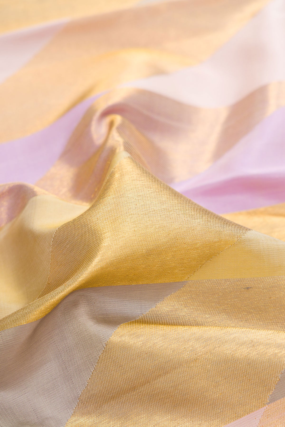 Close up of Pure Silk Multi Color Kanchipuram Saree with Zari Brocade on the body and Without Border.  displaying folds