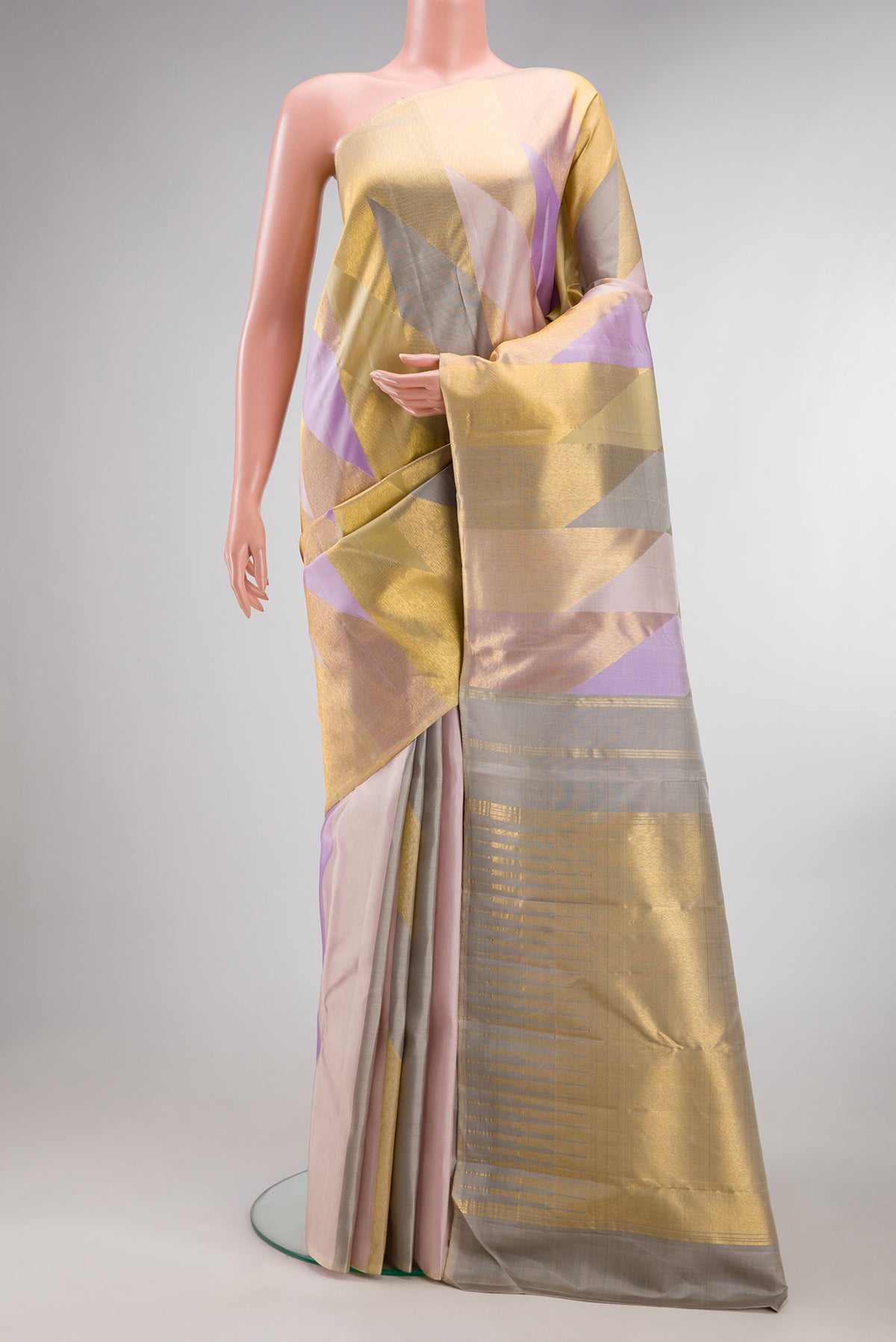 Pure Silk Multi Color Kanchipuram Saree with Zari Brocade on the body and Without Border.  displayed on a mannequin