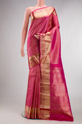 Pure Silk Pink Kanchipuram Saree with Zari Brocade on the body and Fancy Border.  displayed on a mannequin