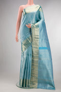 Pure Silk Sky Blue Kanchipuram Saree with Zari Brocade on the body and Zari Border.  displayed on a mannequin