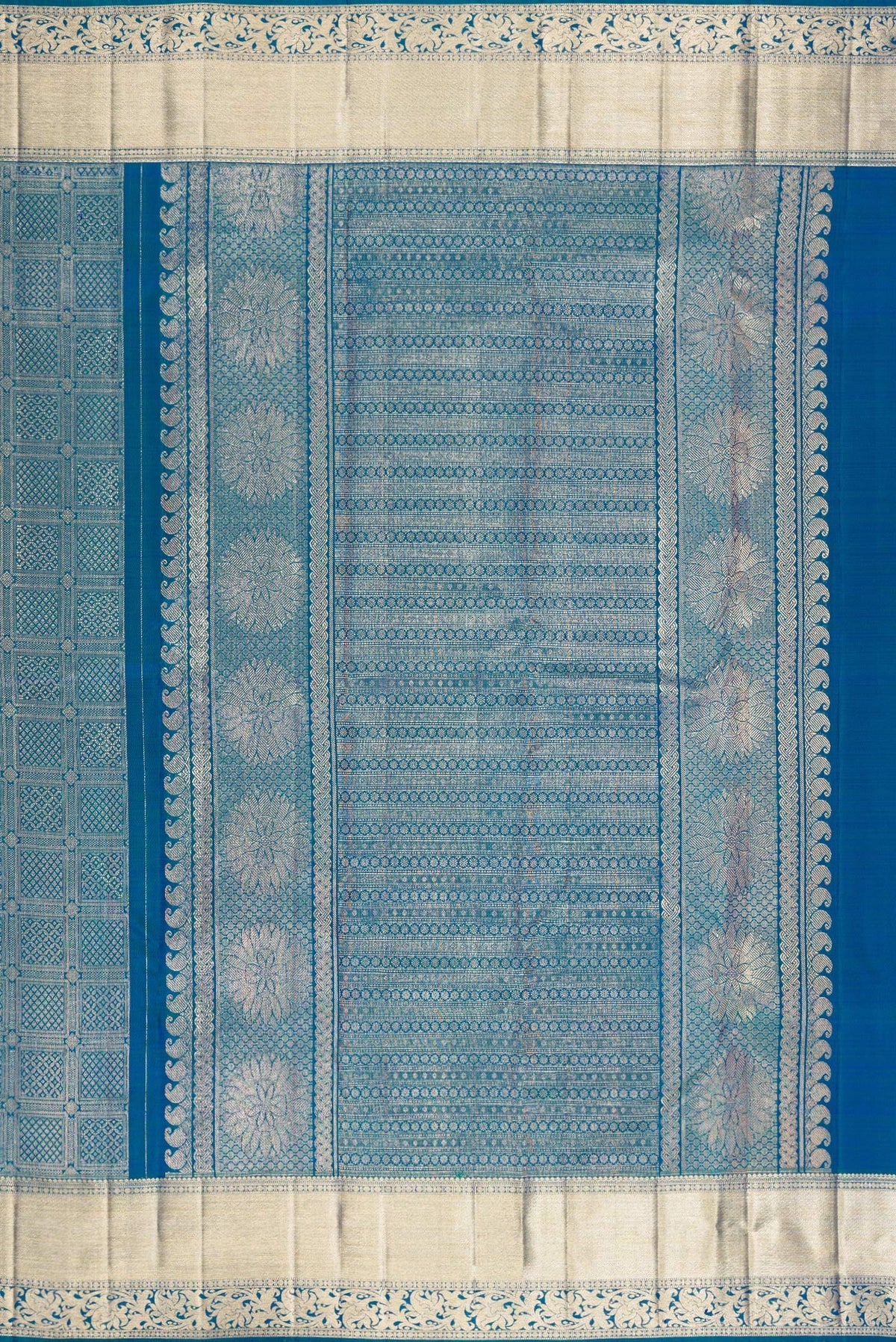 Close up image of the pallu of Pure Silk Peacock Blue Dual Tone Kanchipuram Saree with Zari Brocade on the body and Fancy Border. 