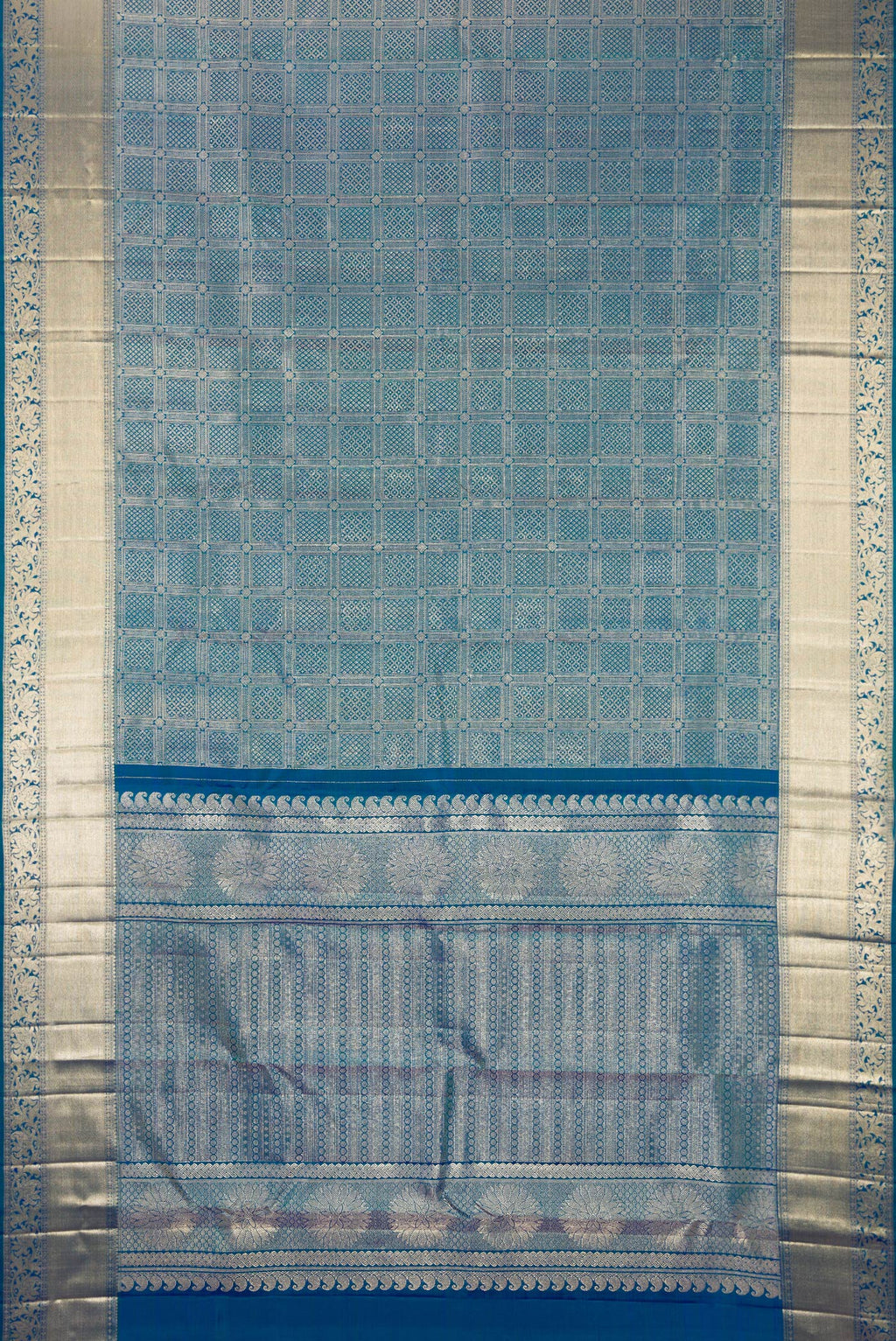 Flat view of Pure Silk Peacock Blue Dual Tone Kanchipuram Saree with Zari Brocade on the body and Fancy Border. 