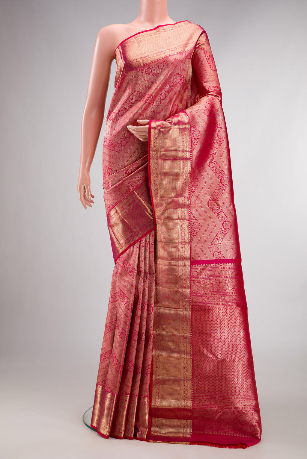 Pure Silk Pink Dual Tone Kanchipuram Saree with Zari Brocade on the body and Zari Border.  displayed on a mannequin