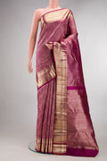 Pure Silk Dark Pink Kanchipuram Saree with Zari Brocade on the body and Zari Border.  displayed on a mannequin