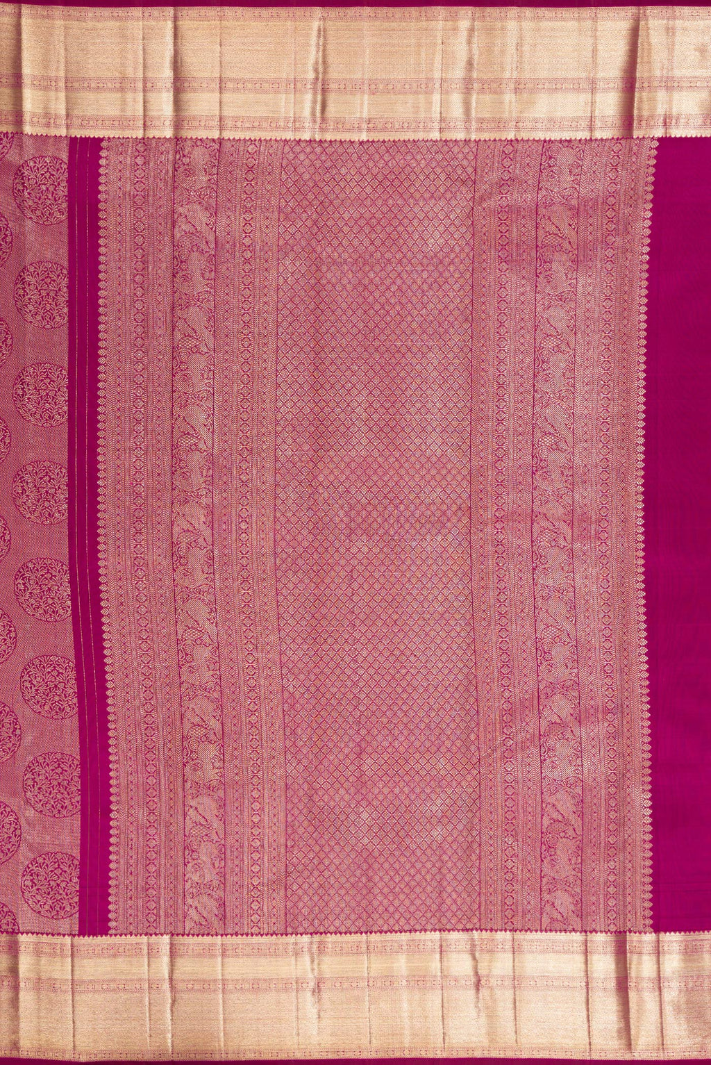 Close up image of the pallu of Pure Silk Dark Pink Kanchipuram Saree with Zari Brocade on the body and Zari Border. 