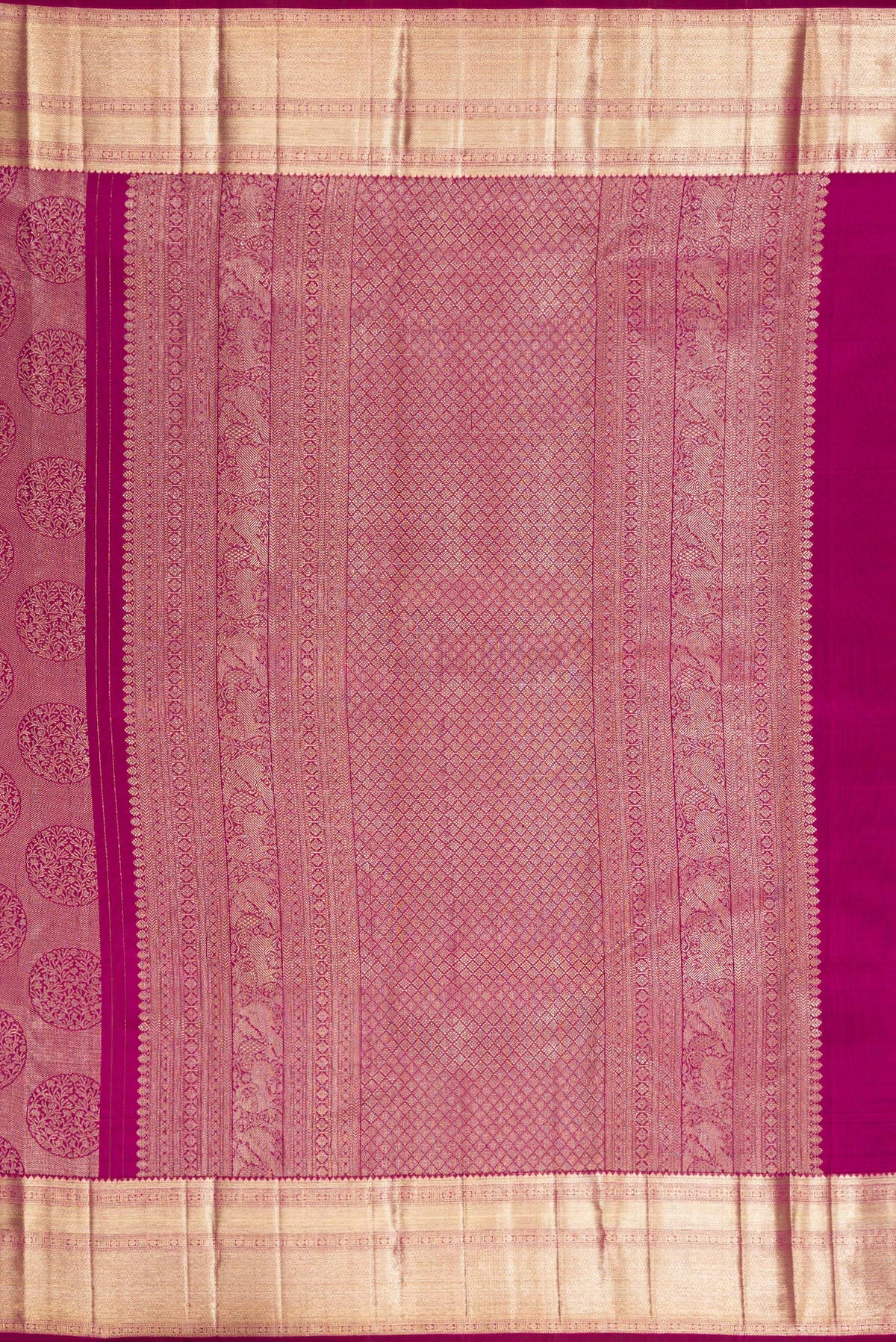Close up image of the pallu of Pure Silk Dark Pink Kanchipuram Saree with Zari Brocade on the body and Zari Border. 