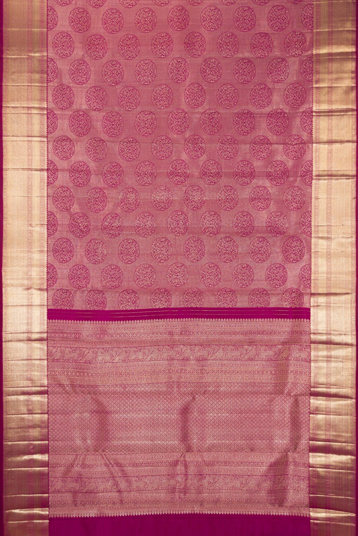 Flat view of Pure Silk Dark Pink Kanchipuram Saree with Zari Brocade on the body and Zari Border. 