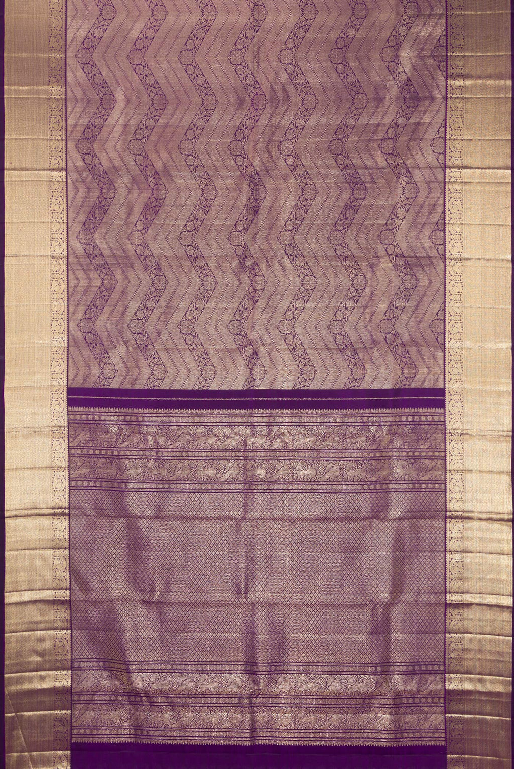 Flat view of Pure Silk Purple Kanchipuram Saree with Zari Brocade on the body and Zari Border. 