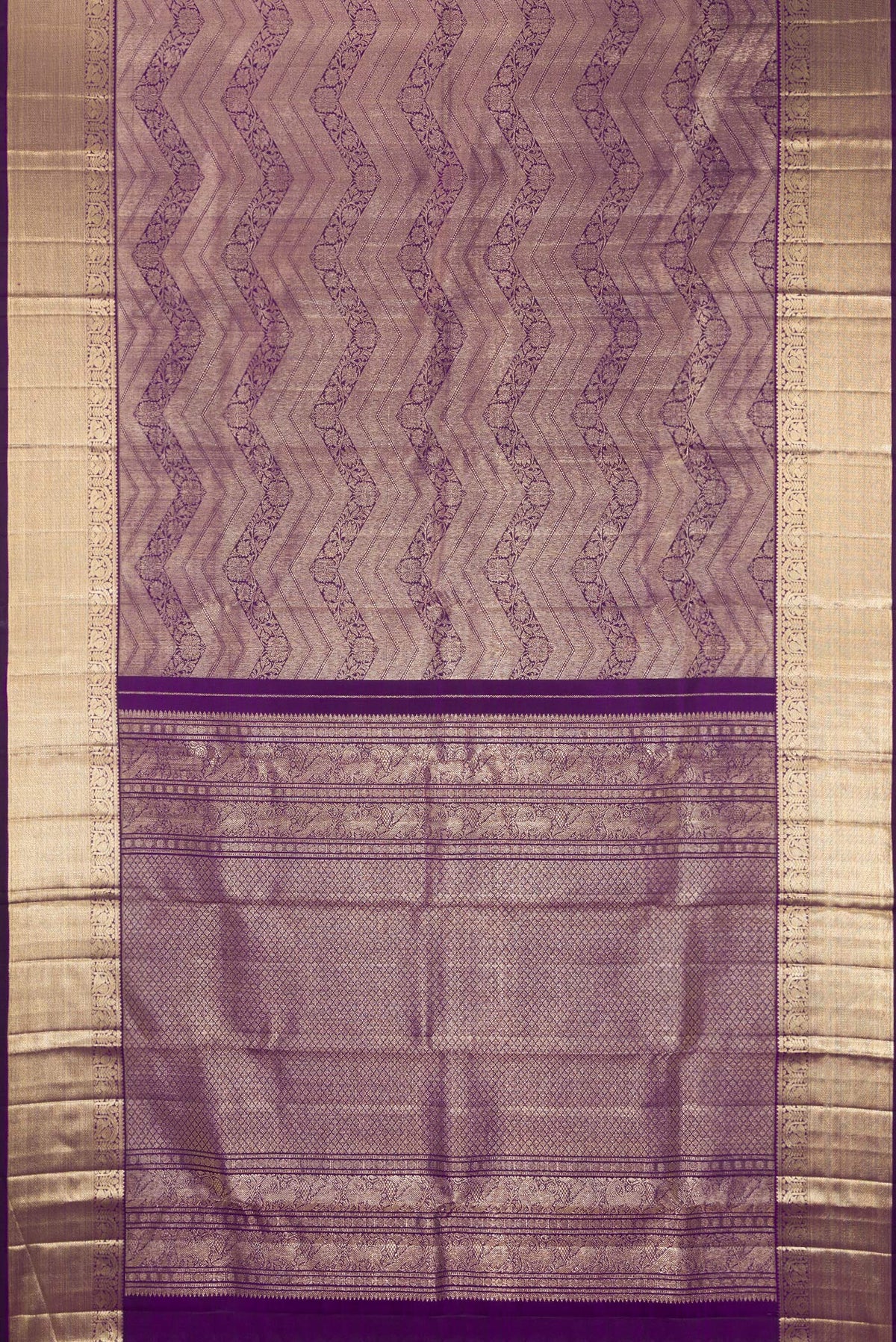 Flat view of Pure Silk Purple Kanchipuram Saree with Zari Brocade on the body and Zari Border. 