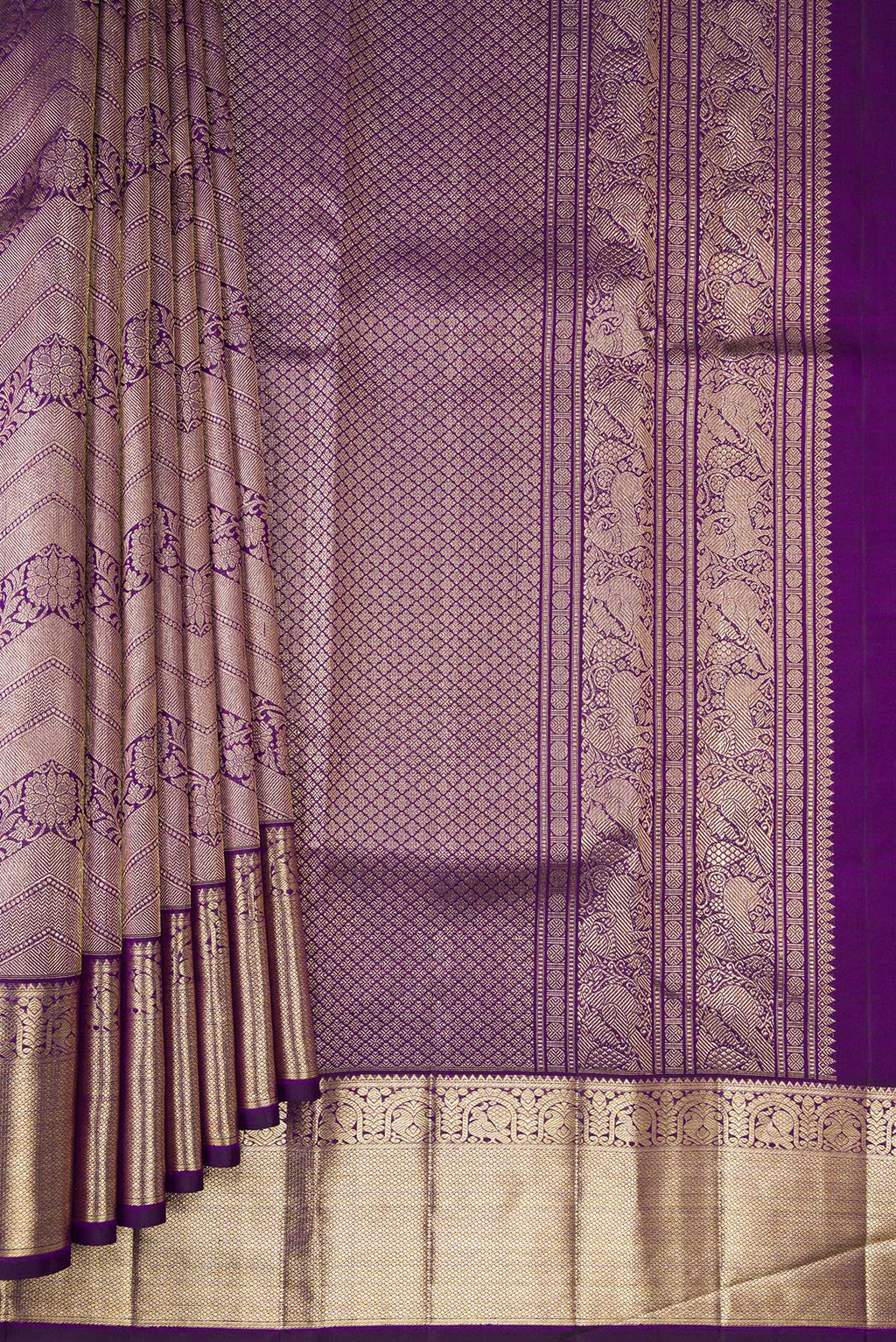 Pleats and pallu of Pure Silk Purple Kanchipuram Saree with Zari Brocade on the body and Zari Border. 