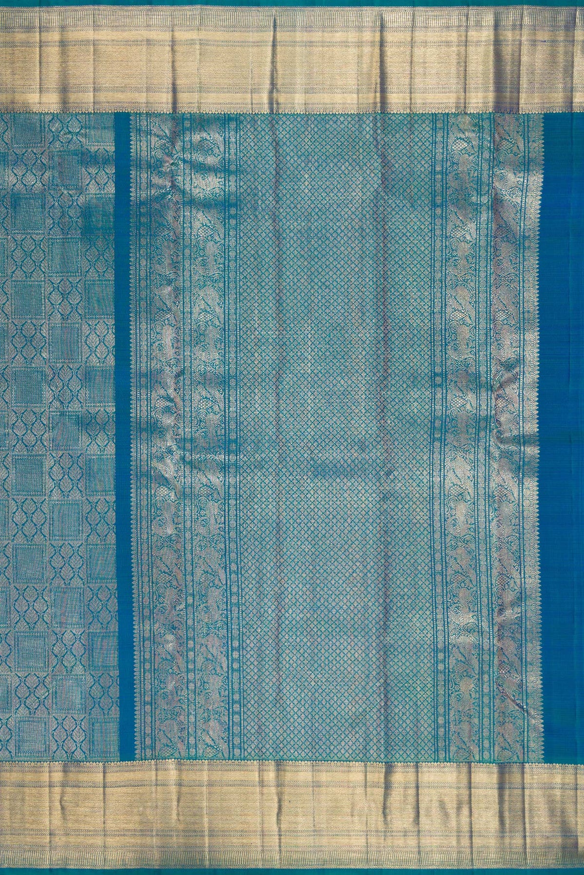 Close up image of the pallu of Pure Silk Peacock Blue Dual Tone Kanchipuram Saree with Zari Brocade on the body and Zari Border. 