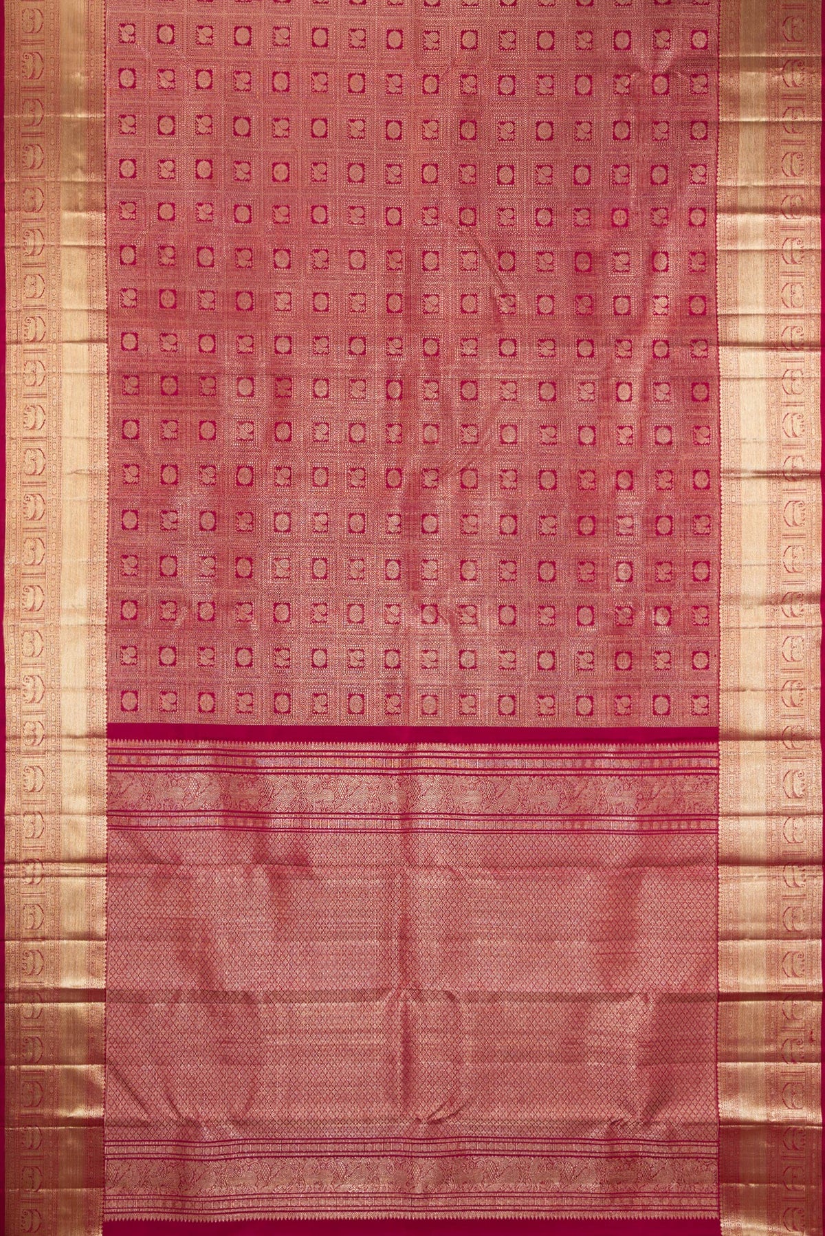 Flat view of Pure Silk Maroon Kanchipuram Saree with Zari Brocade on the body and Zari Border. 
