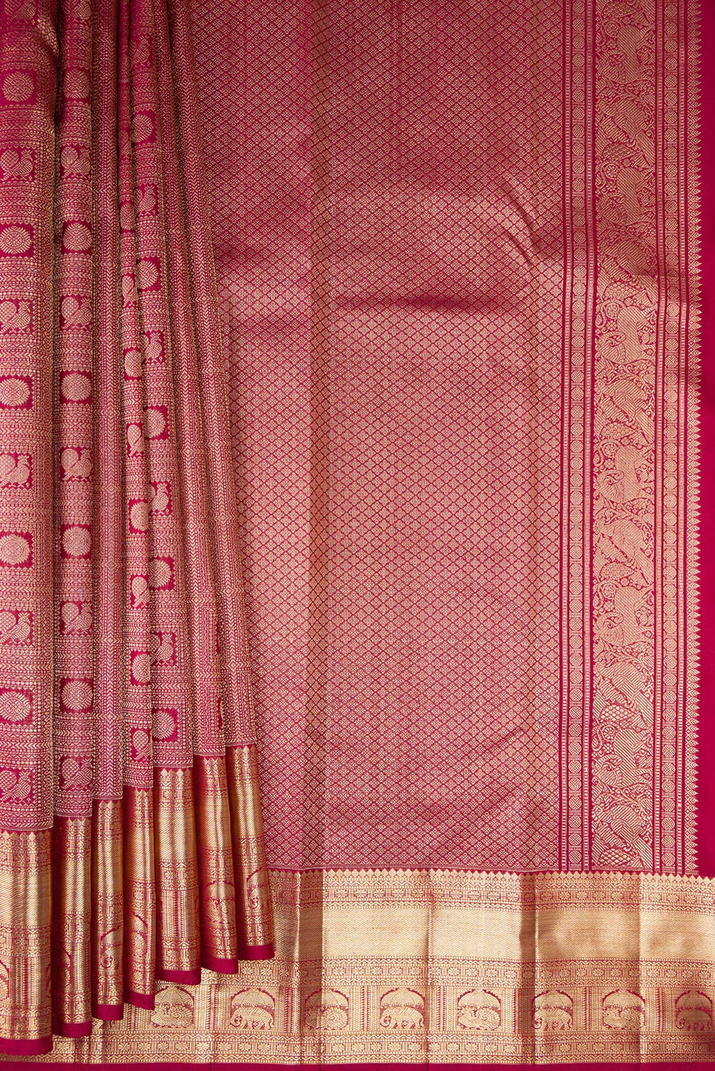 Pleats and pallu of Pure Silk Maroon Kanchipuram Saree with Zari Brocade on the body and Zari Border. 