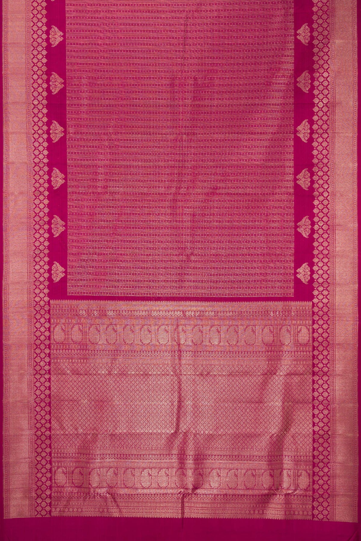 Flat view of Pure Silk Dark Pink Kanchipuram Saree with Zari Brocade on the body and Zari Border. 