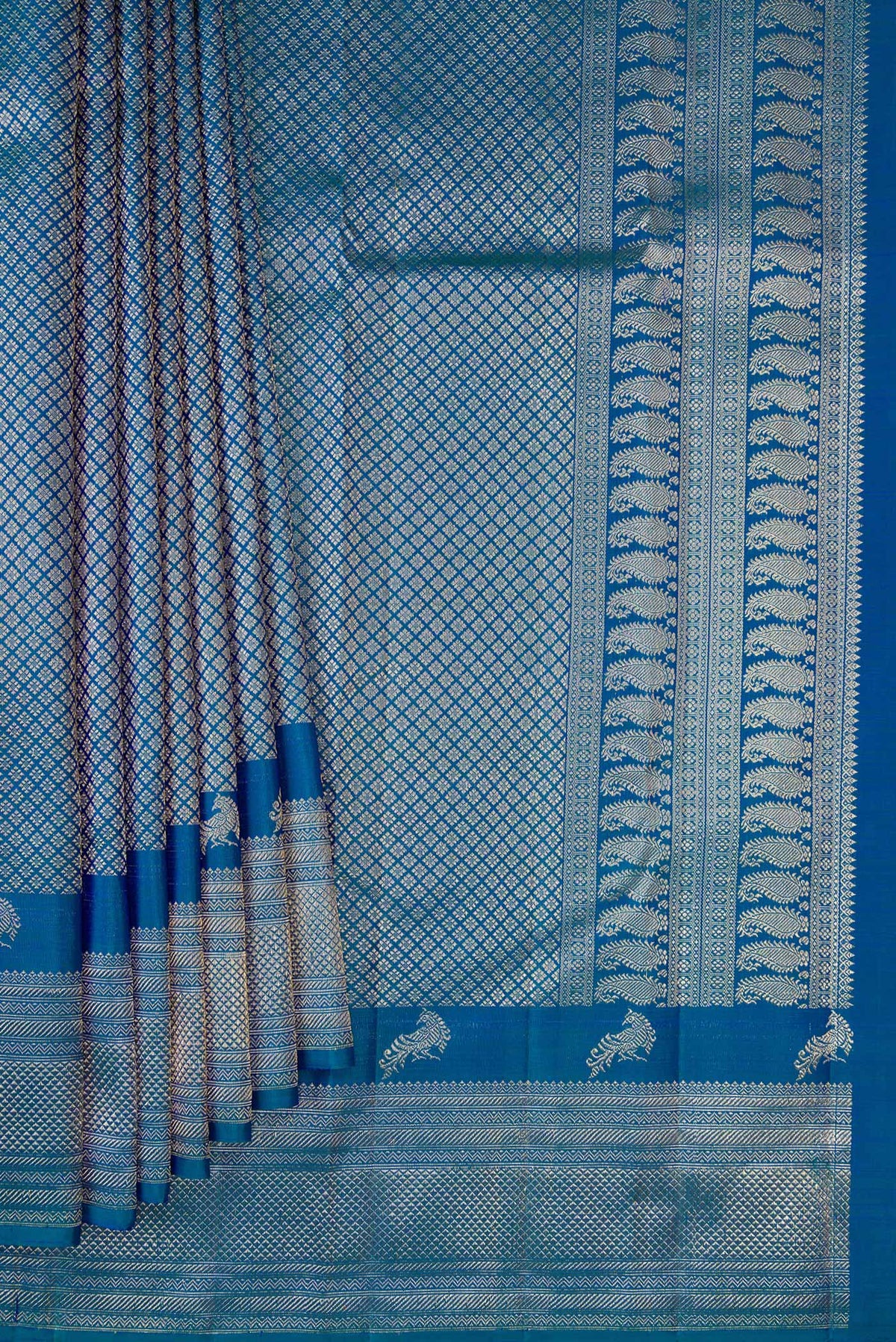Pleats and pallu of Pure Silk Peacock Blue Kanchipuram Saree with Zari Brocade on the body and Fancy Border. 