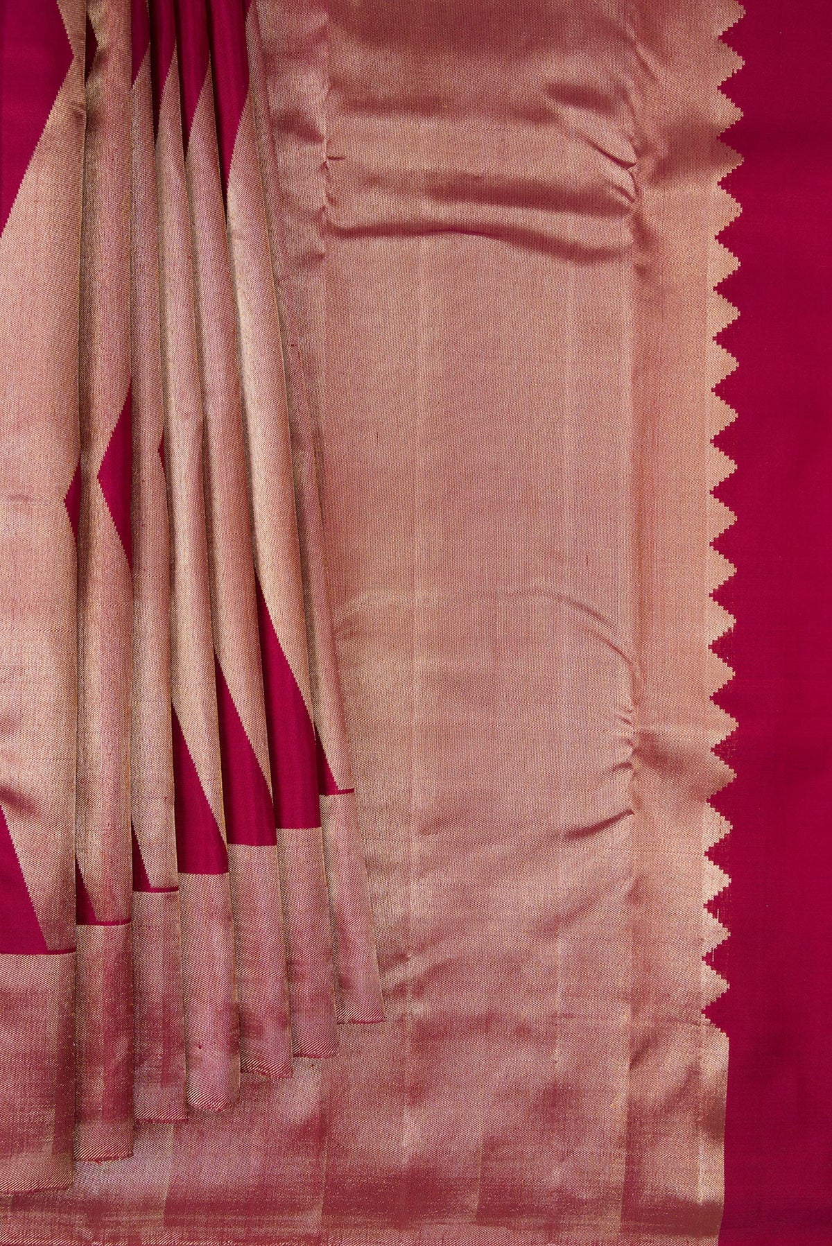 Pleats and pallu of Pure Silk Maroon Kanchipuram Saree with Zari Butta on the body and Zari Border. 