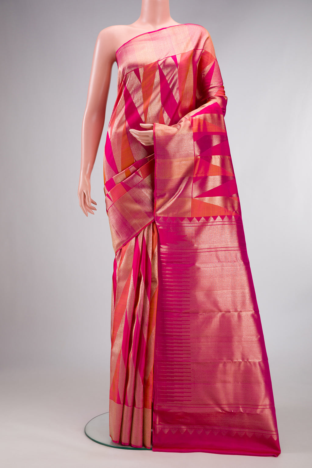 Pure Silk Dark Pink Dual Tone Kanchipuram Saree with Zari Brocade on the body and Zari Border.  displayed on a mannequin