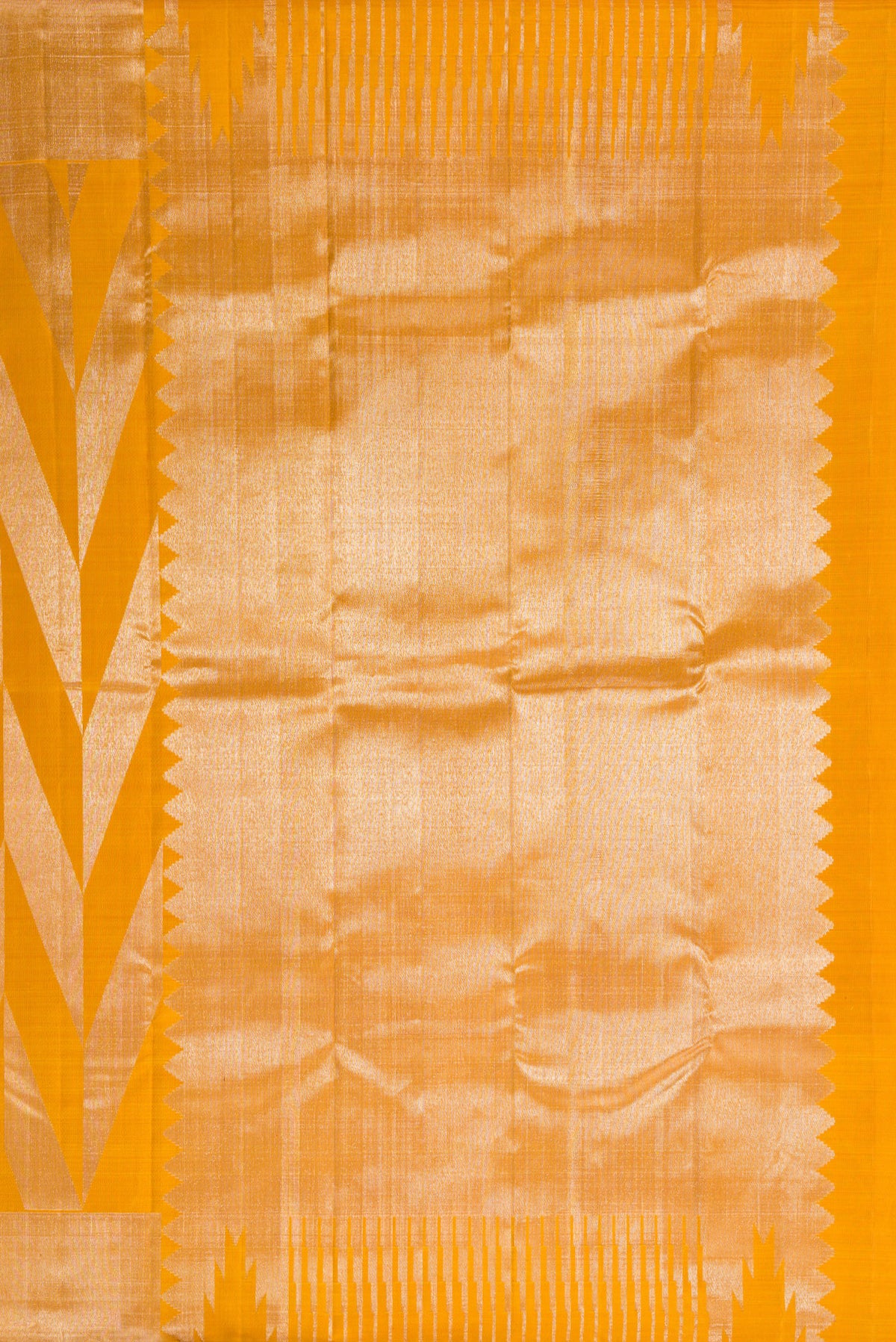 Close up image of the pallu of Pure Silk Mustard Kanchipuram Saree with Zari Brocade on the body and Zari Border. 