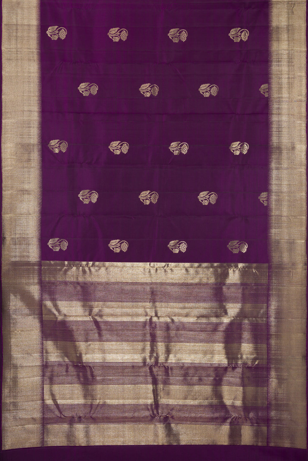 Flat view of Pure Silk Purple Kanjivaram Saree with Zari Butta on the body and Zari Border. 