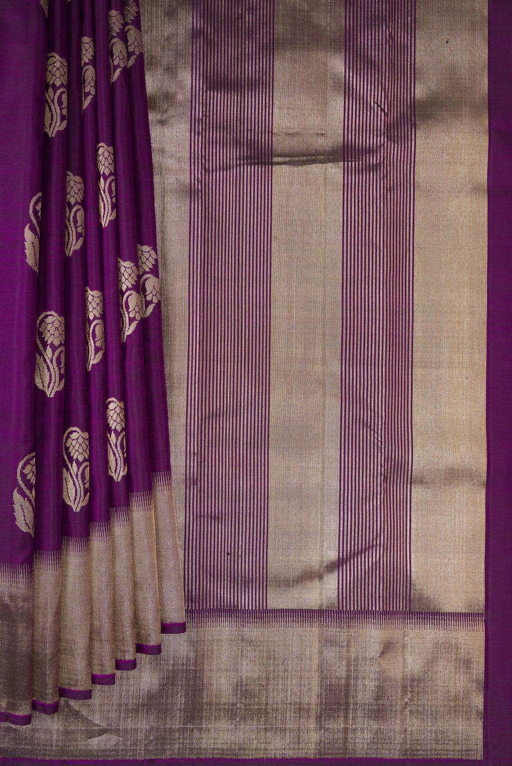 Pleats and pallu of Pure Silk Purple Kanjivaram Saree with Zari Butta on the body and Zari Border. 