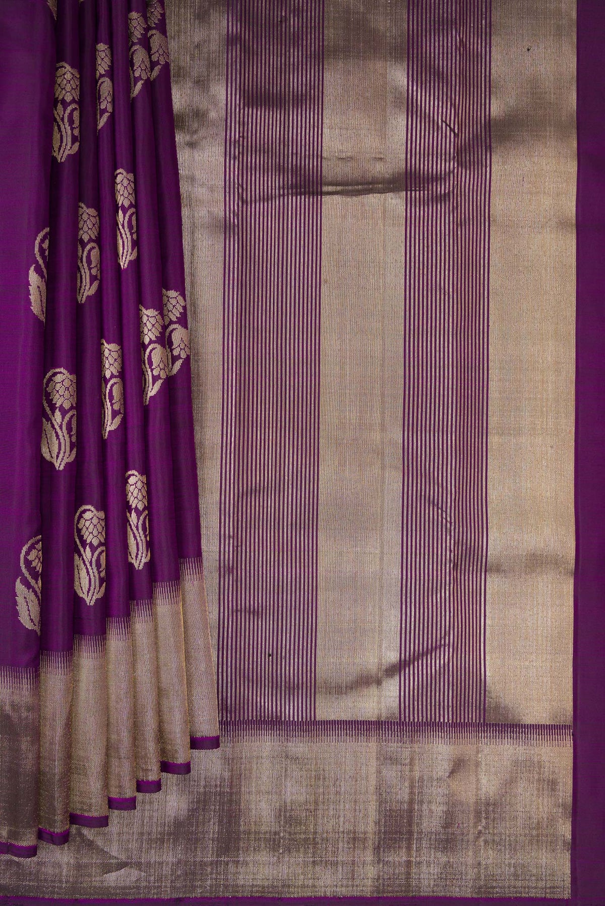 Pleats and pallu of Pure Silk Purple Kanjivaram Saree with Zari Butta on the body and Zari Border. 