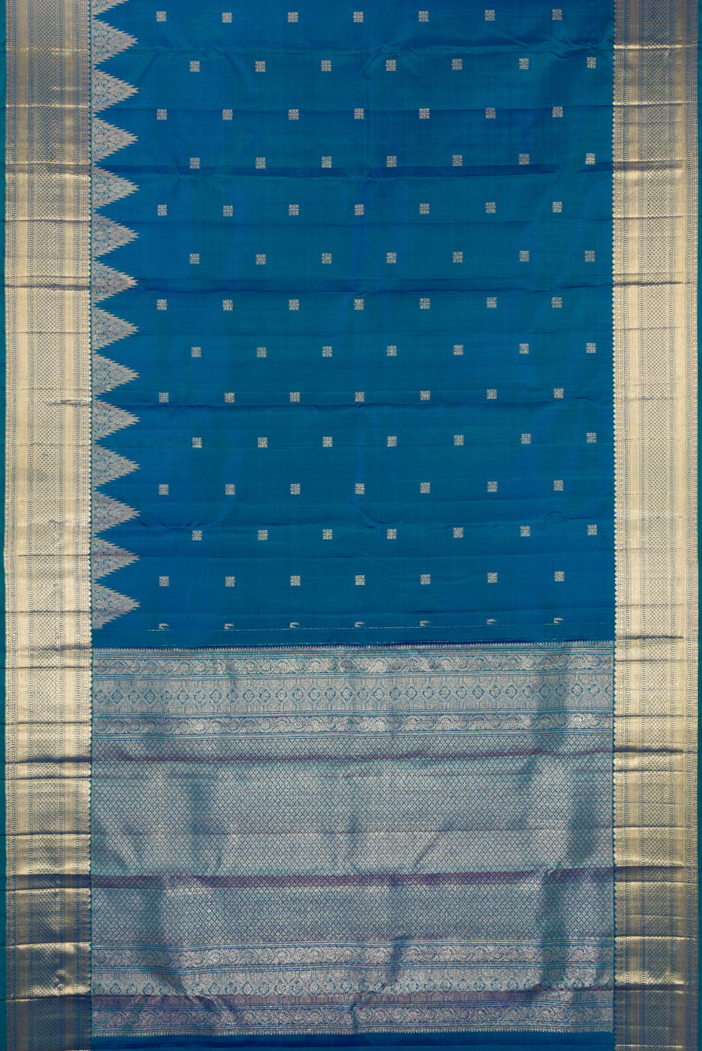 Flat view of Pure Silk Peacock Blue Dual Tone Kanjivaram Saree with Zari Butta on the body and Fancy Border. 