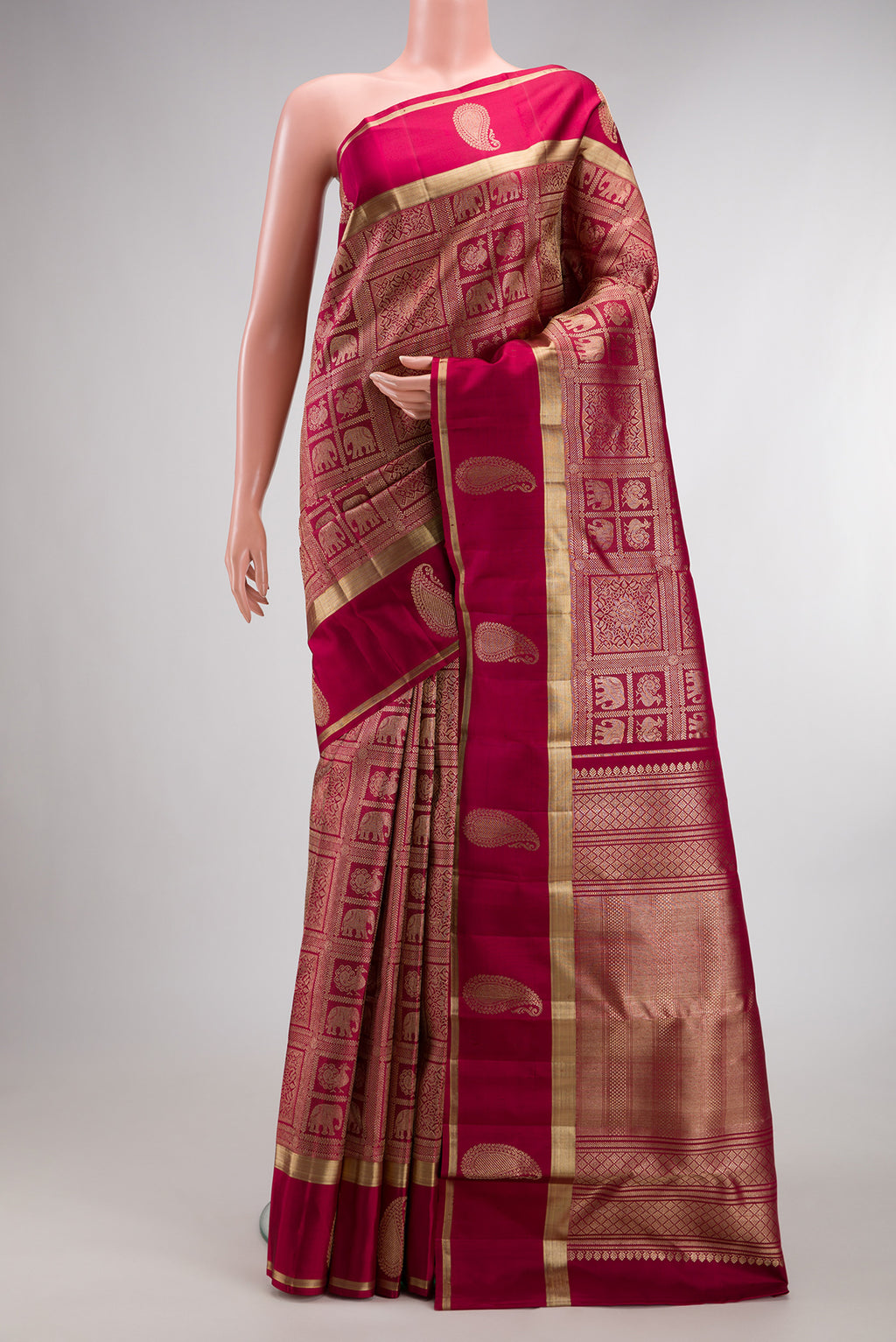 Pure Silk Maroon Kanchipuram Saree with Zari Brocade on the body and Fancy Border.  displayed on a mannequin