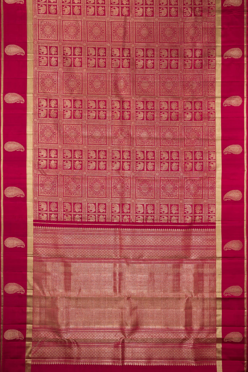 Flat view of Pure Silk Maroon Kanchipuram Saree with Zari Brocade on the body and Fancy Border. 