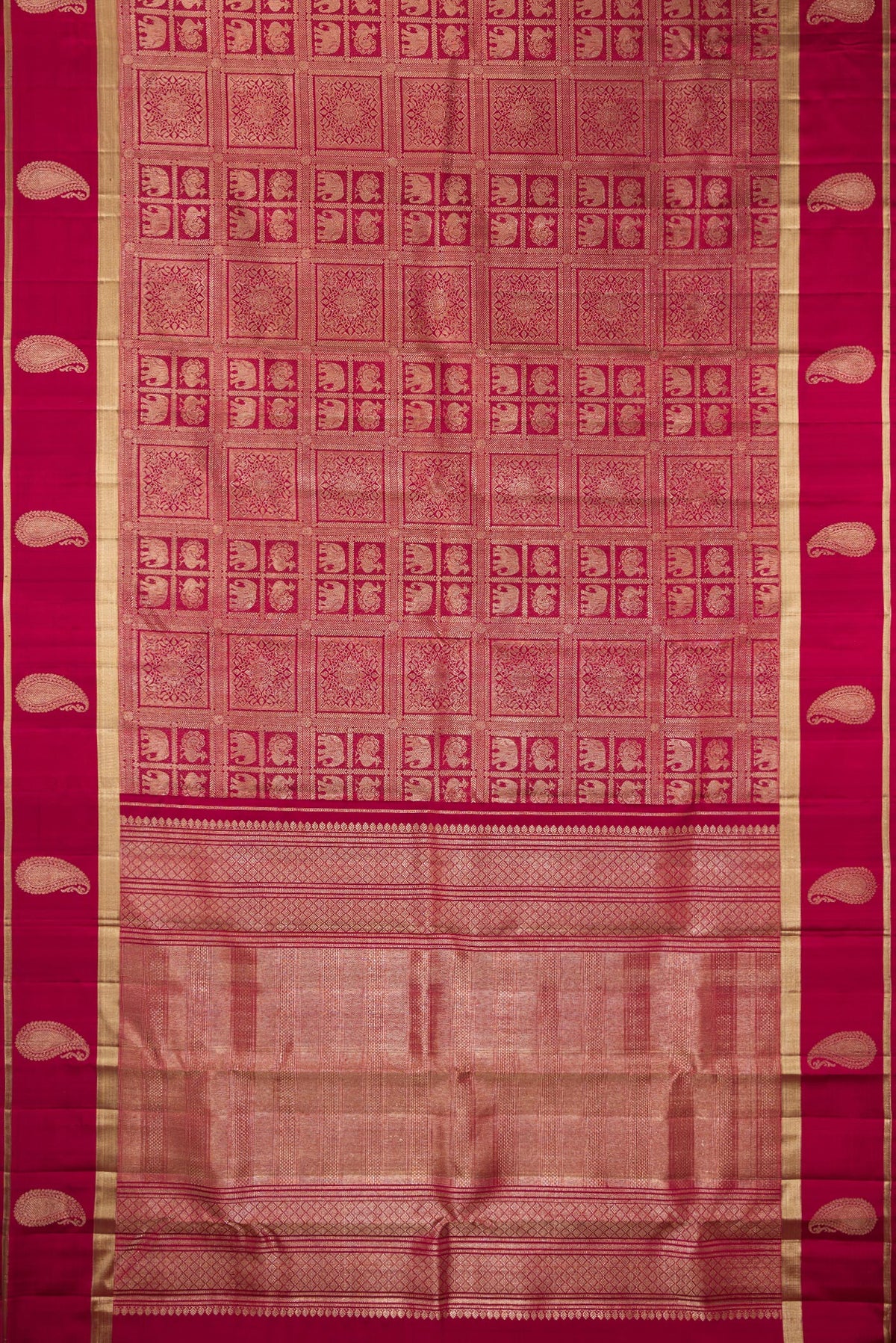 Flat view of Pure Silk Maroon Kanchipuram Saree with Zari Brocade on the body and Fancy Border. 