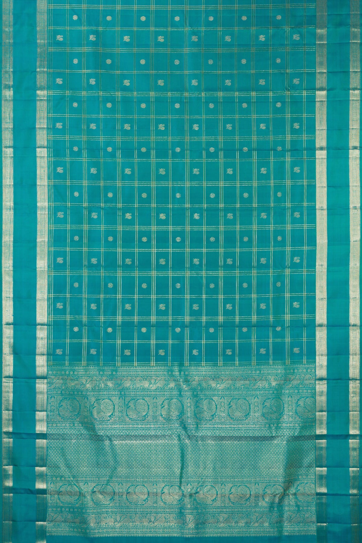 Flat view of Pure Silk Turquoise Kanchipuram Saree with Checked design on the body and Zari Border. 