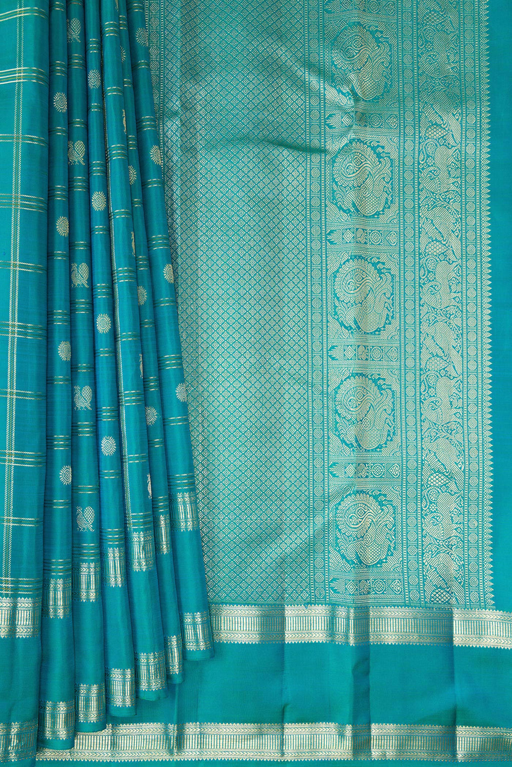 Pleats and pallu of Pure Silk Turquoise Kanchipuram Saree with Checked design on the body and Zari Border. 