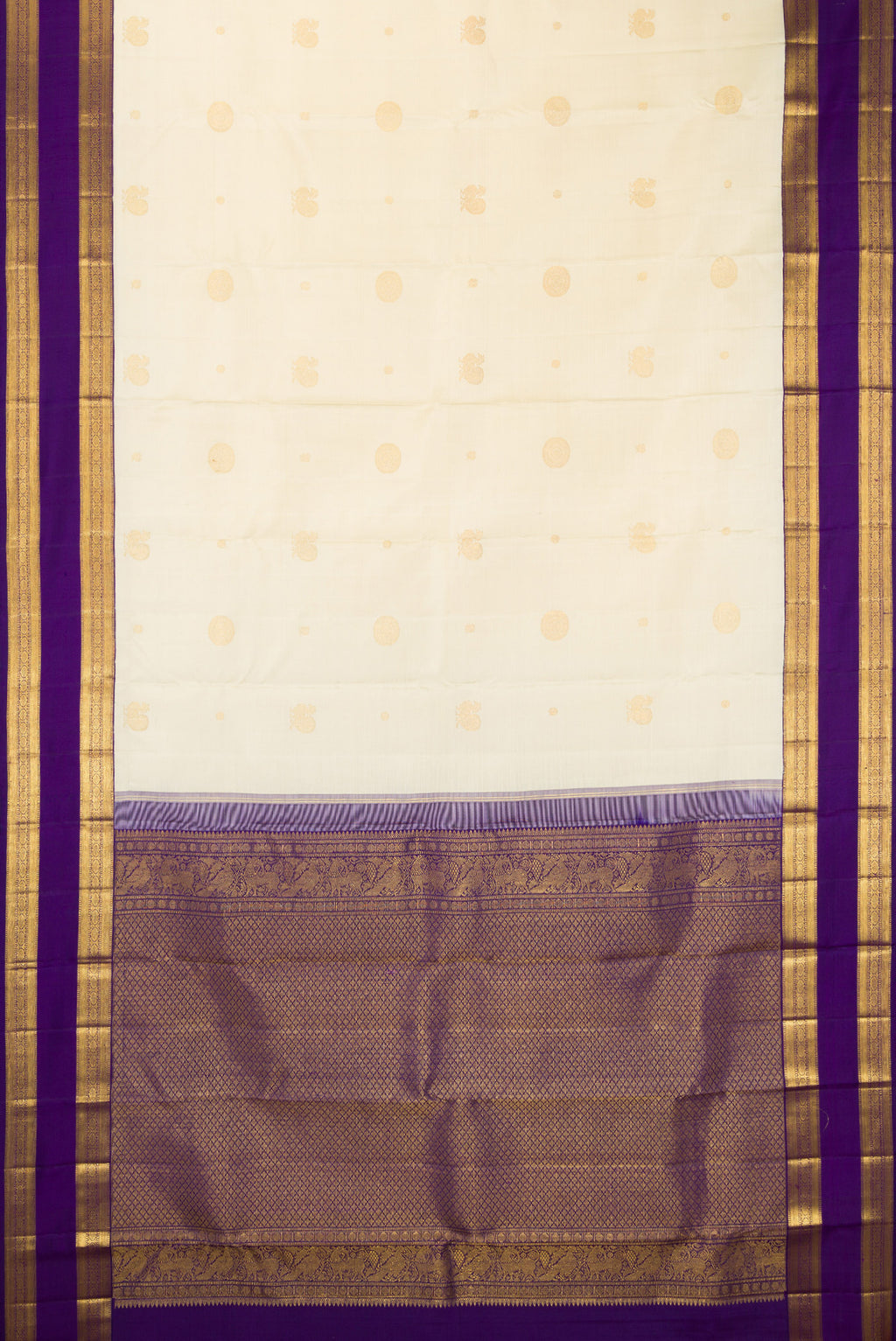 Flat view of Pure Silk Off White Kanchipuram Saree with Zari Butta on the body and Zari Border. 