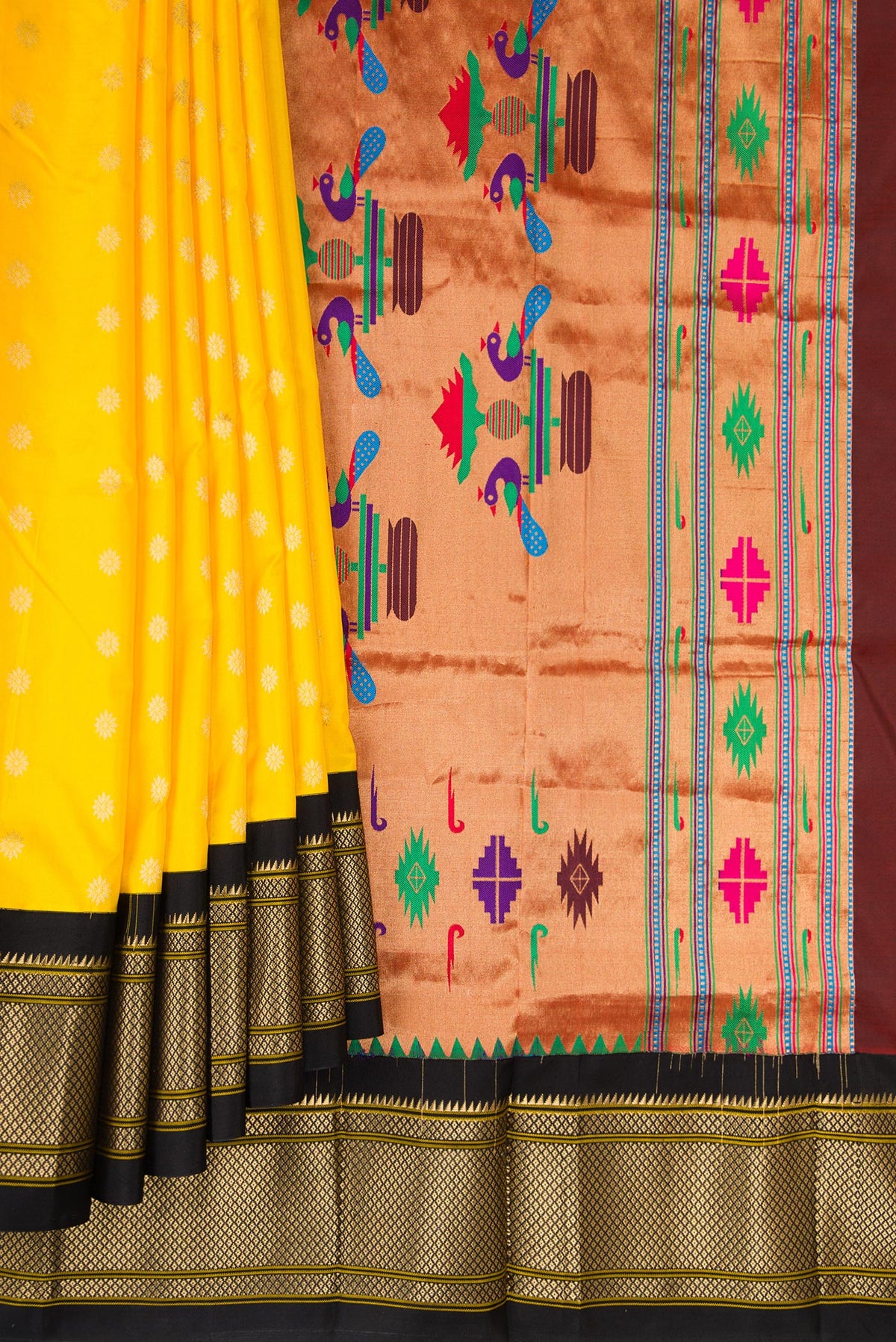Pleats and pallu of Pure Silk Yellow Paithani Saree with Zari Butta on the body and Zari Border. 