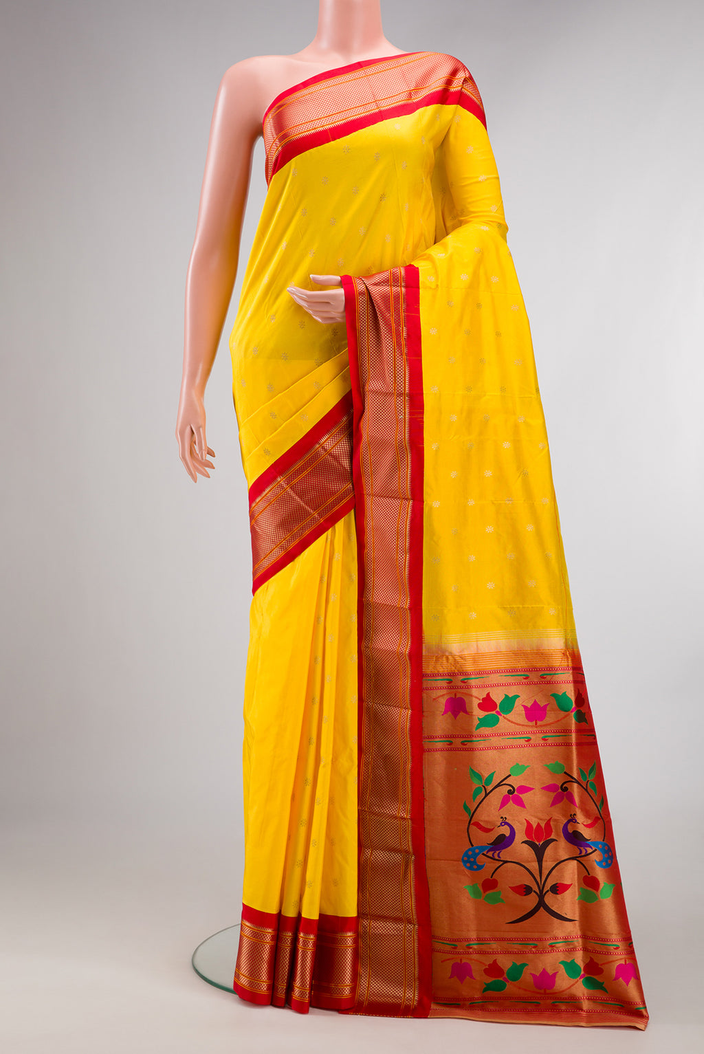 Pure Silk Yellow Paithani Saree with Zari Butta on the body and Zari Border.  displayed on a mannequin