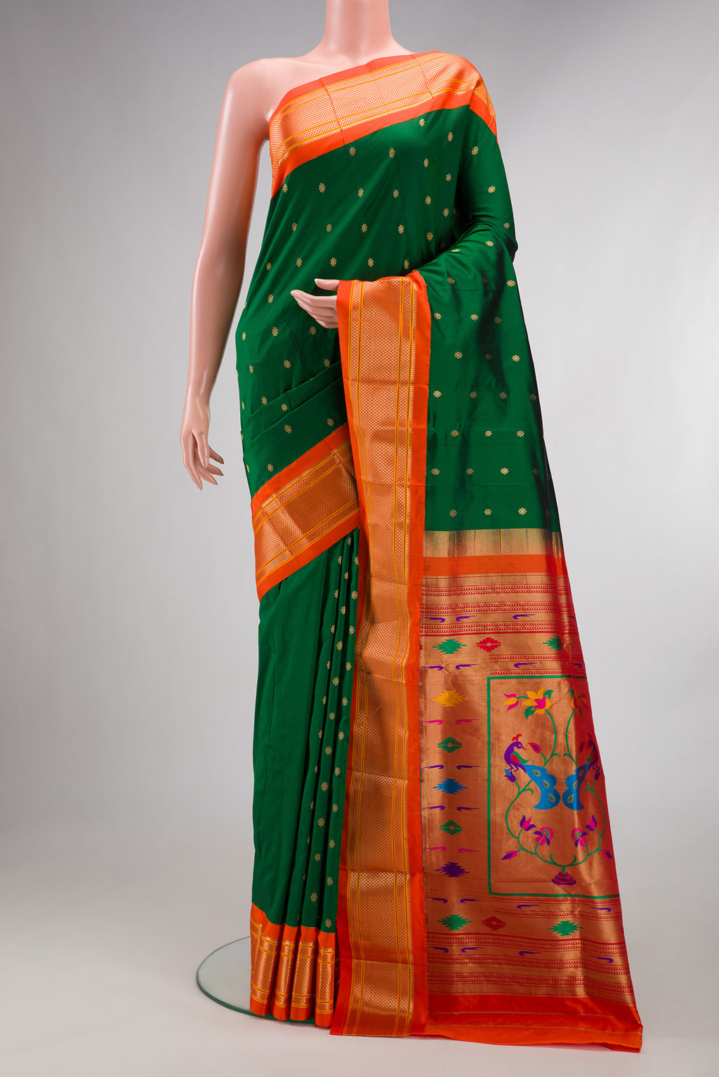 Pure Silk Bottle Green Dual Tone Paithani Saree with Zari Butta on the body and Zari Border.  displayed on a mannequin
