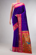 Pure Silk Royal Blue Paithani Saree with Zari Butta on the body and Zari Border.  displayed on a mannequin