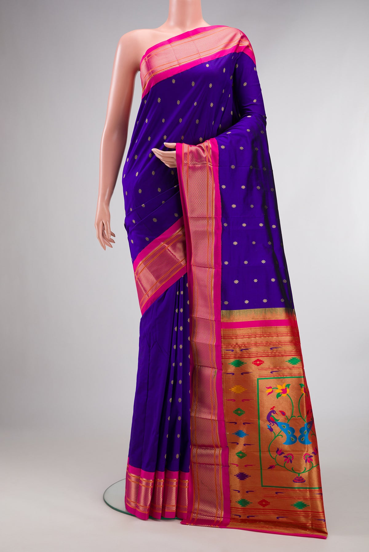 Pure Silk Royal Blue Paithani Saree with Zari Butta on the body and Zari Border.  displayed on a mannequin