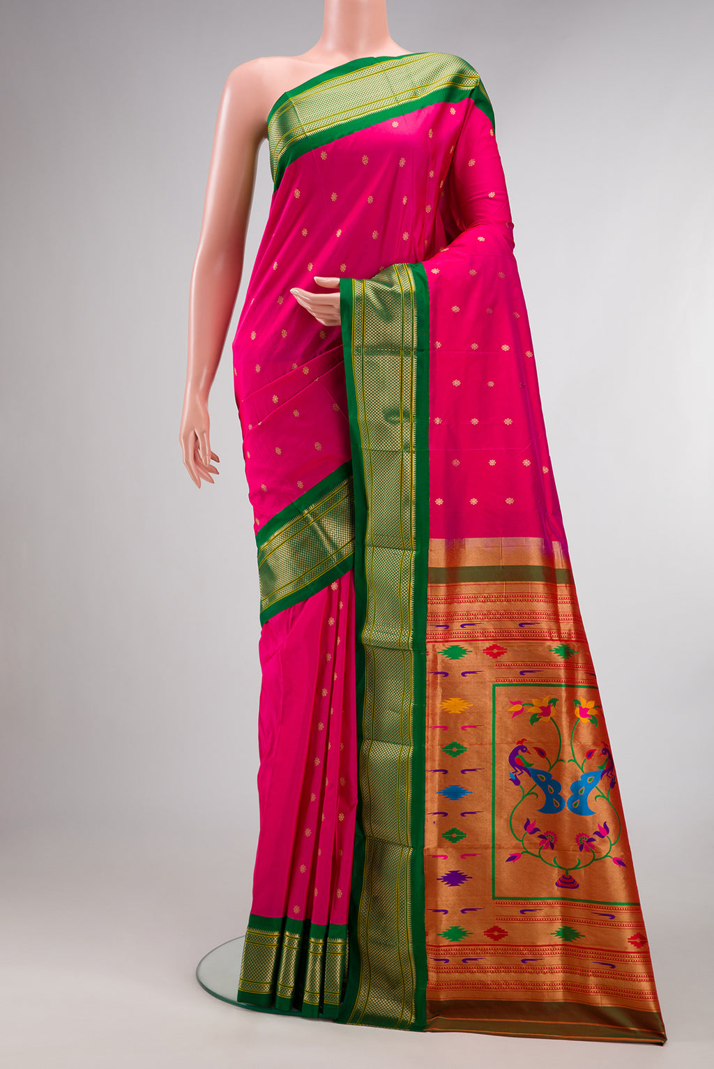 Pure Silk Dark Pink Paithani Saree with Zari Butta on the body and Zari Border.  displayed on a mannequin