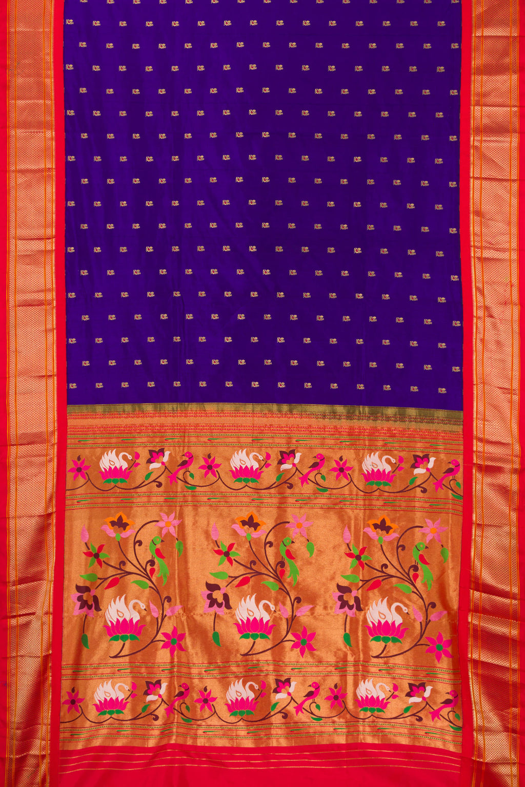Flat view of Pure Silk Royal Blue Paithani Saree with Zari And Thread Butta on the body and Zari Border. 