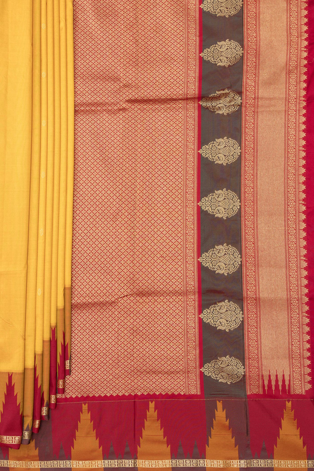 Pleats and pallu of Pure Silk Yellow Bangalore Saree with Zari Butta on the body and Temple Border. 