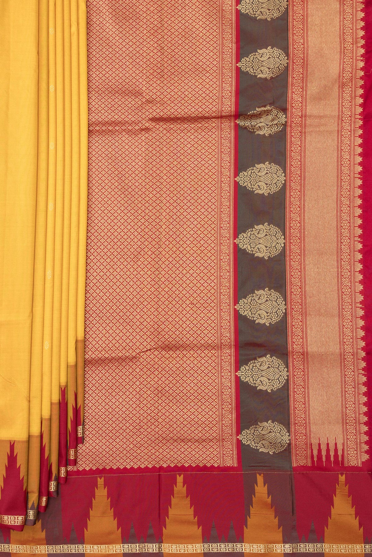 Pleats and pallu of Pure Silk Yellow Bangalore Saree with Zari Butta on the body and Temple Border. 