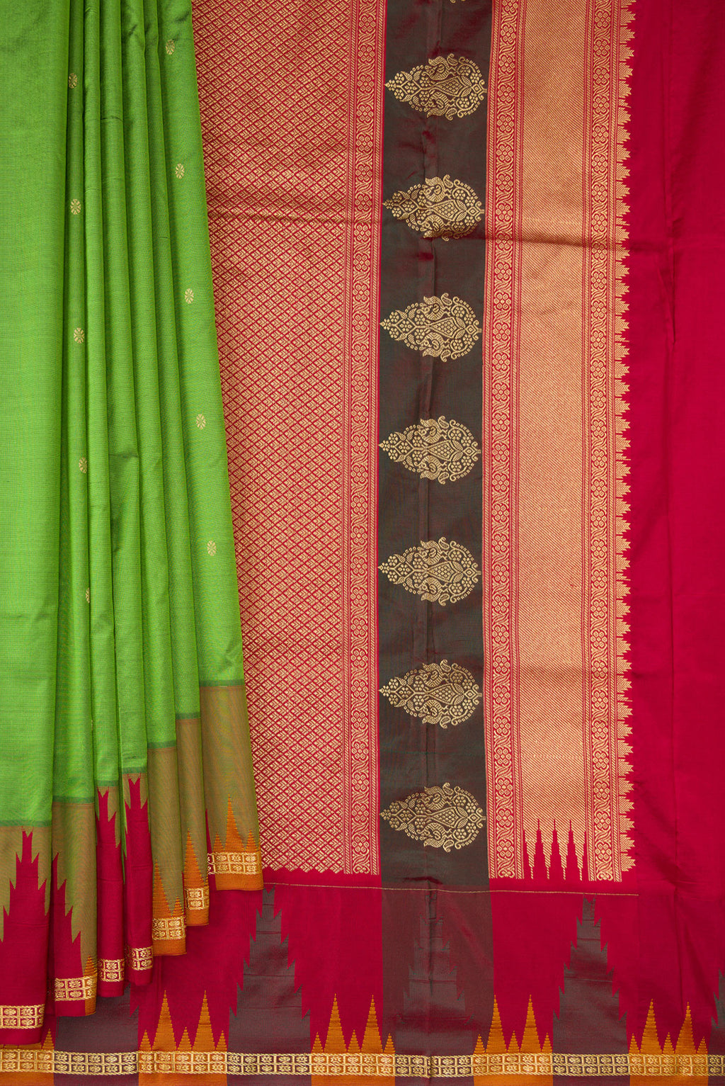 Pleats and pallu of Pure Silk Green Bangalore Saree with Zari Butta on the body and Temple Border. 