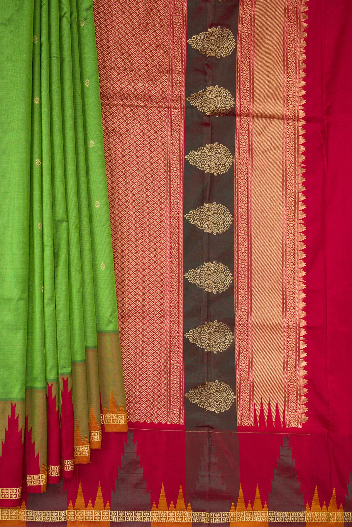 Pleats and pallu of Pure Silk Green Bangalore Saree with Zari Butta on the body and Temple Border. 