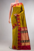 Pure Silk Mehandi Green Bangalore Saree with Zari Butta on the body and Temple Border.  displayed on a mannequin