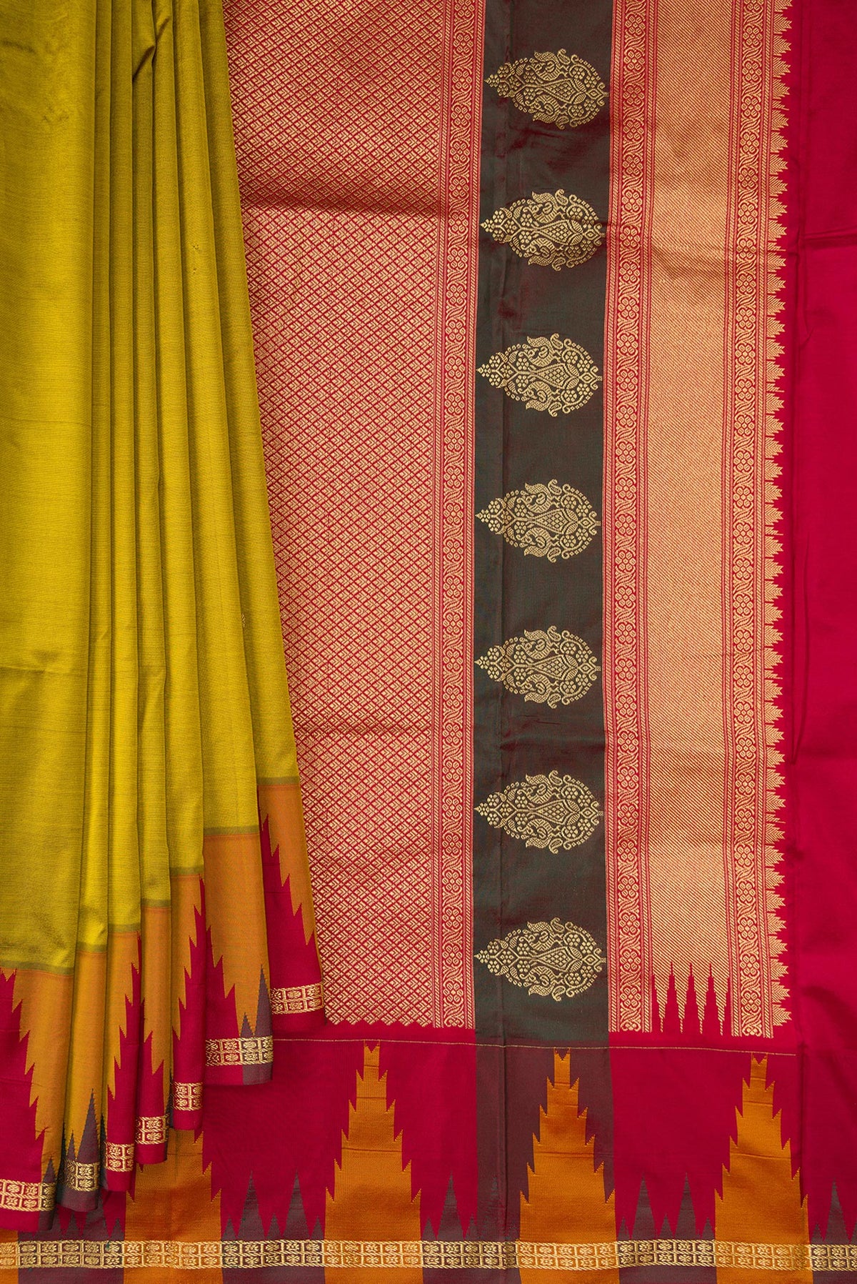 Pleats and pallu of Pure Silk Mehandi Green Bangalore Saree with Zari Butta on the body and Temple Border. 