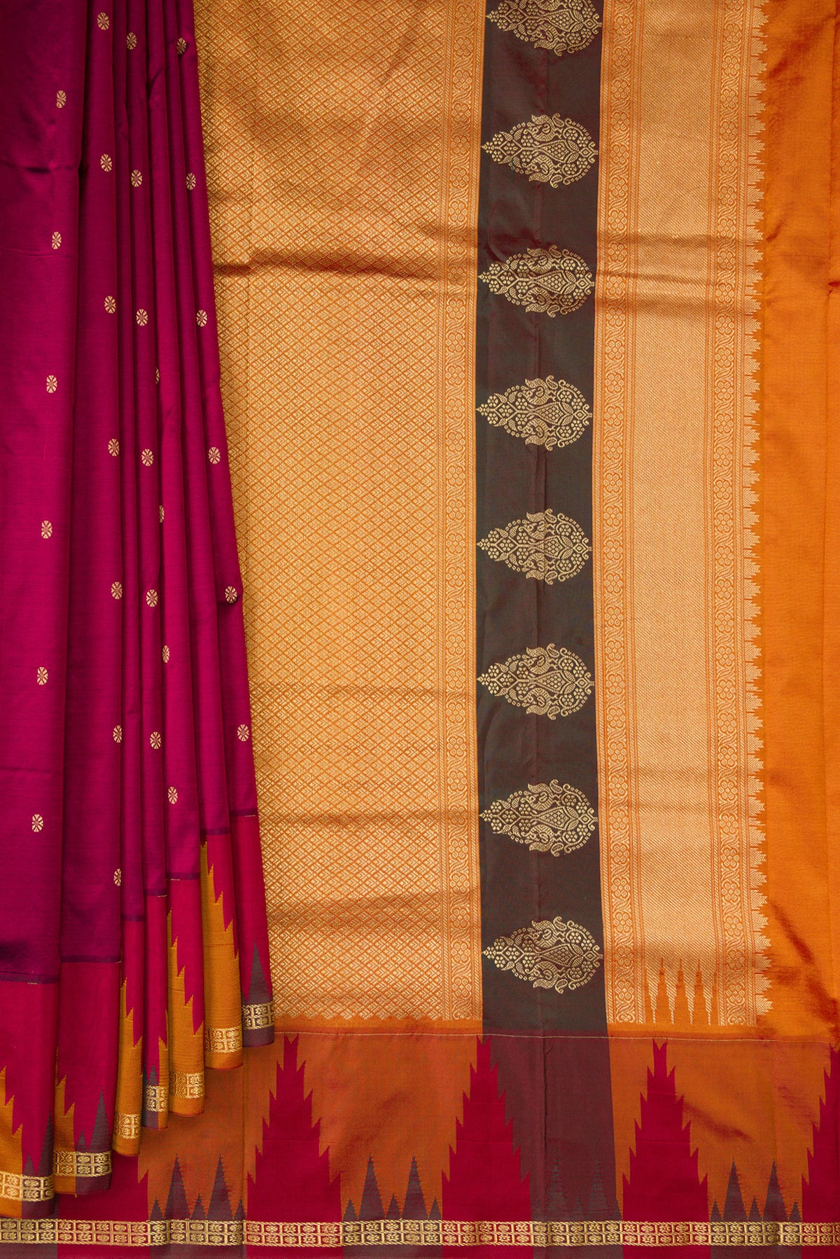 Pleats and pallu of Pure Silk Magenta Bangalore Saree with Zari Butta on the body and Temple Border. 